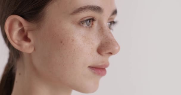 Portrait Beautiful Young Woman Touching Her Soft Skin Applying Face — стоковое видео