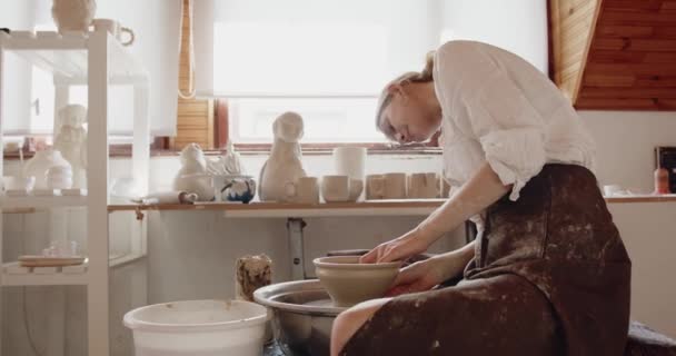 Beautiful Woman Potter Throwing Clay Vase Spinning Wheel While Making — Video Stock