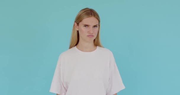 Unhappy Unsatisfied Young Woman Wearing White Shirt Showing Thumbs Dislike — Stock Video