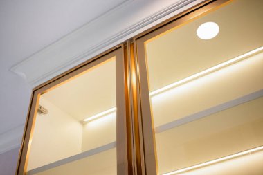 Close-up of white gold cabinets wood in house