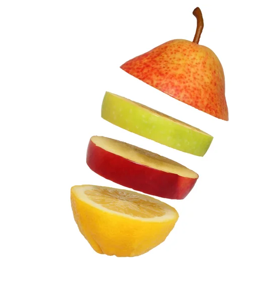 Levitující kousky ovoce — Stock fotografie