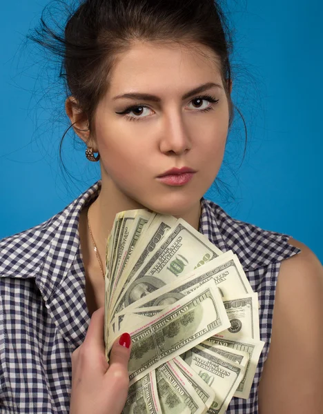 Woman holding dollars — Stock Photo, Image