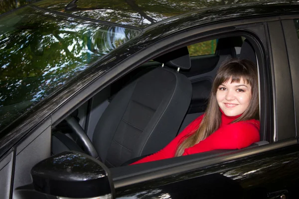 A menina no carro — Fotografia de Stock