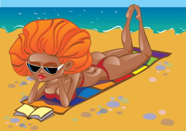 Kızıl saçlı kız sahilde bir kitapla