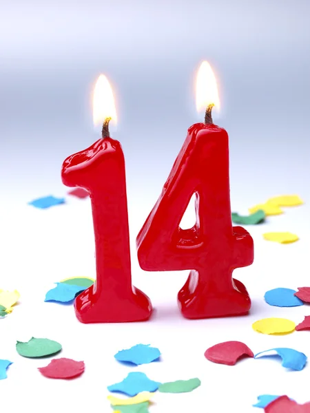 Bougies d'anniversaire montrant Nr. 14 ans Images De Stock Libres De Droits