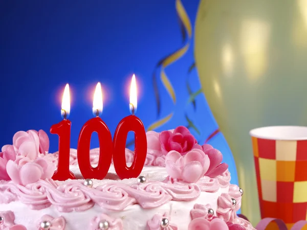 Birthday cake with red candles showing Nr. 100 — Stockfoto