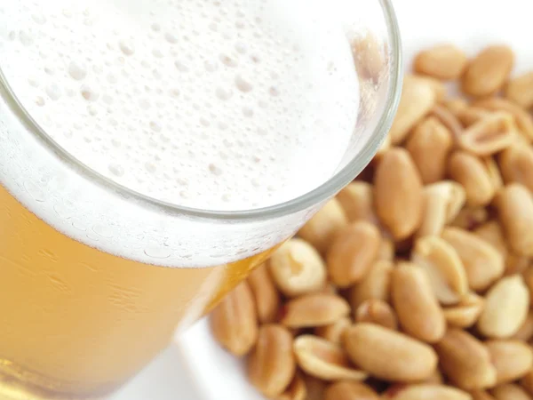 Appetizer with beer and fried peanuts. — Stock Photo, Image