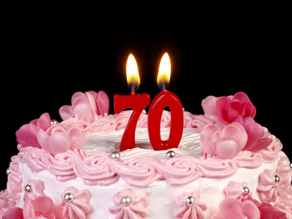 Gâteau d'anniversaire avec des bougies rouges montrant Nr. 70 ans Images De Stock Libres De Droits