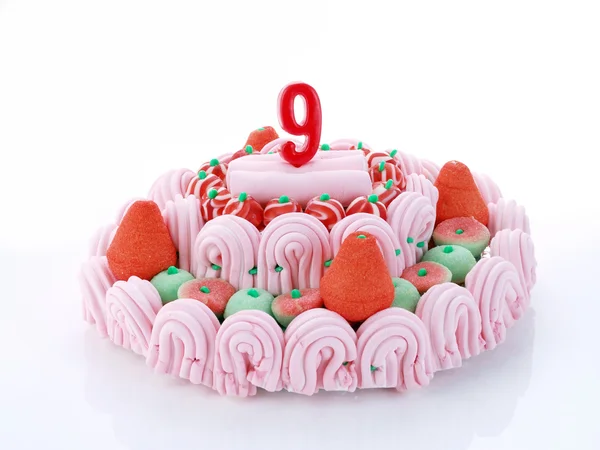 День рождения торт с красными свечами показывает Nr. 9 месяцев — стоковое фото