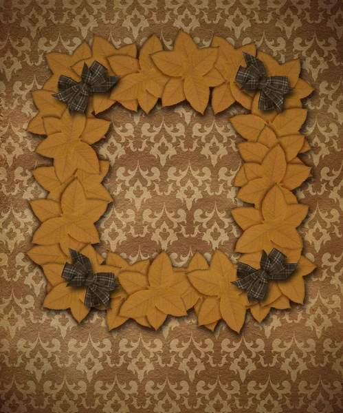 Vintage-Rahmen an der Wand mit Herbstblättern — Stockfoto