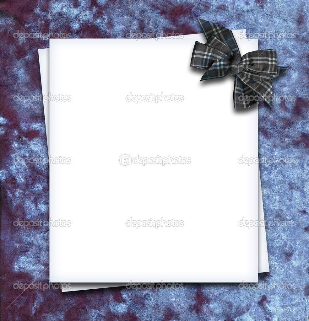 Paper blank with bow in corner on velvet fabric