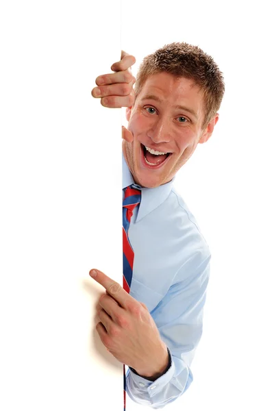 Well Dressed Man Hiding Behind Sign Pointing To Sign — Stock Photo, Image