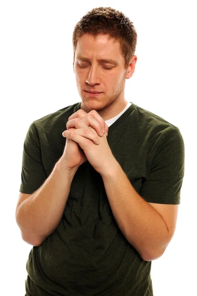 Hombre orando con las manos cerradas —  Fotos de Stock