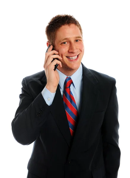 Schöner Geschäftsmann mit riesigem Lächeln am Telefon — Stockfoto