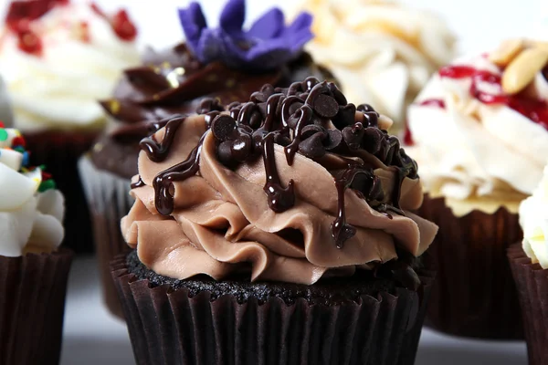 Chocolade cupcake en behandelt Stockafbeelding