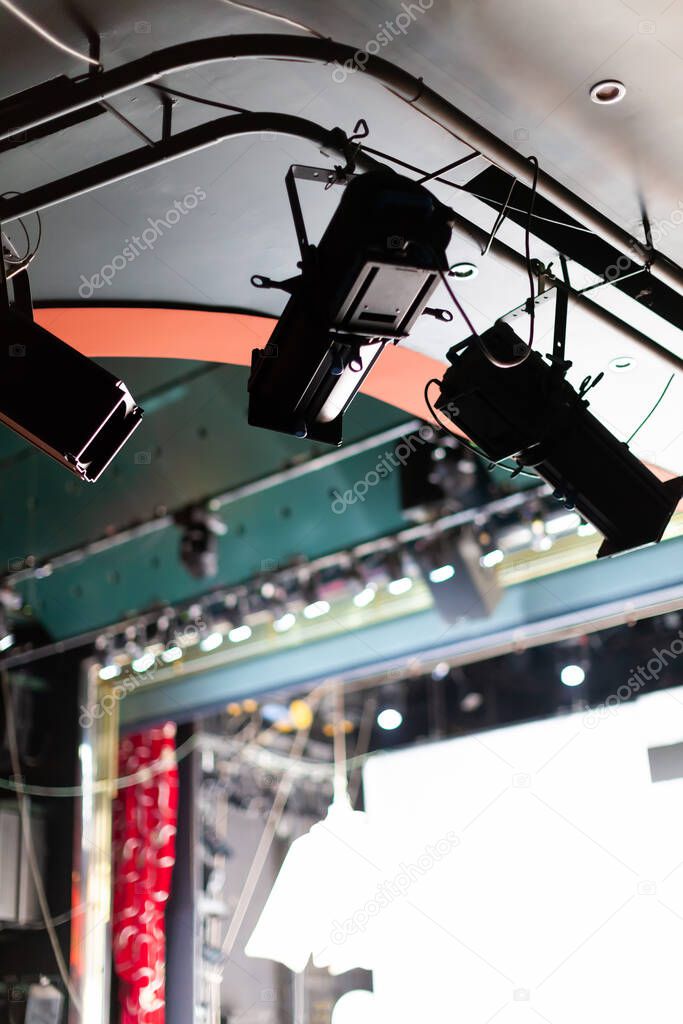 many theater flood lights above stage