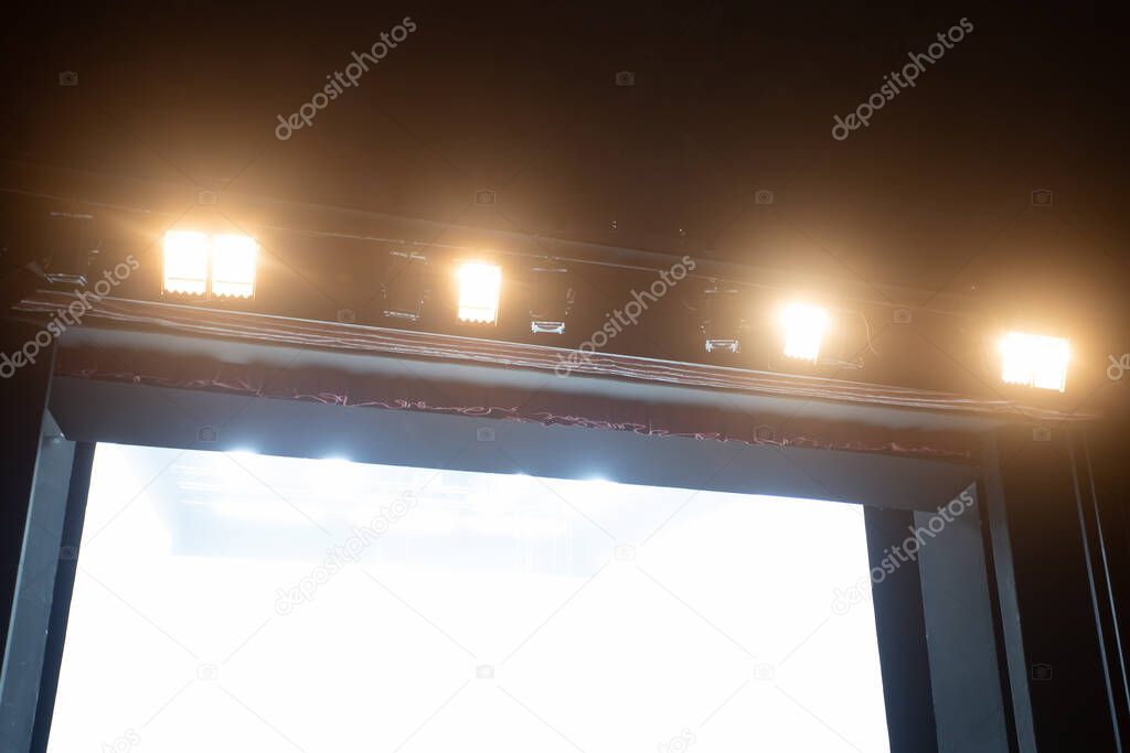 flood lights above theatre stage