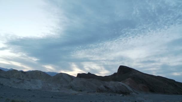 Time lapse of clouds over desert rocks — Stock Video