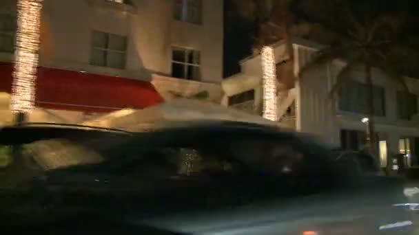 Driving Miami Ocean Drive at Night Buildings Art Deco — Stock Video