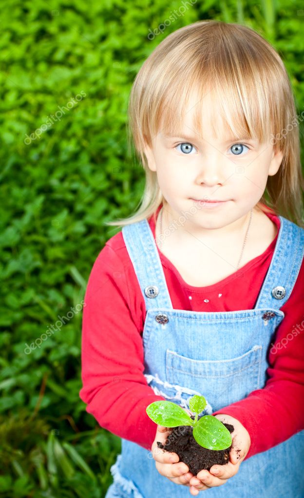 Child with sprout Stock Photo by ©dnaumoid 13573093