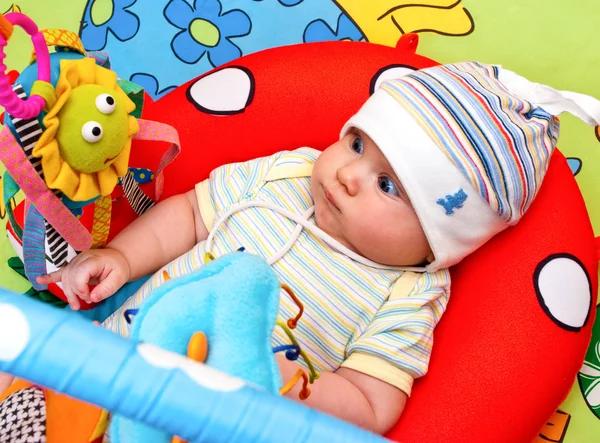 Infant in baby gym — Stock Photo, Image