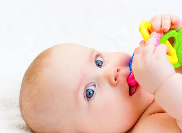 Infant with teething toy — Stock Photo, Image