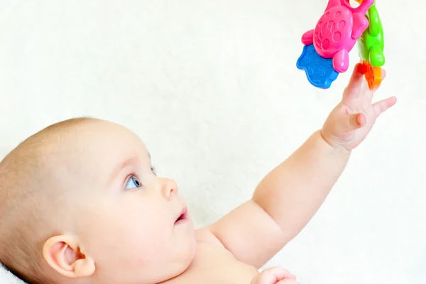 Infant with toy — Stock Photo, Image