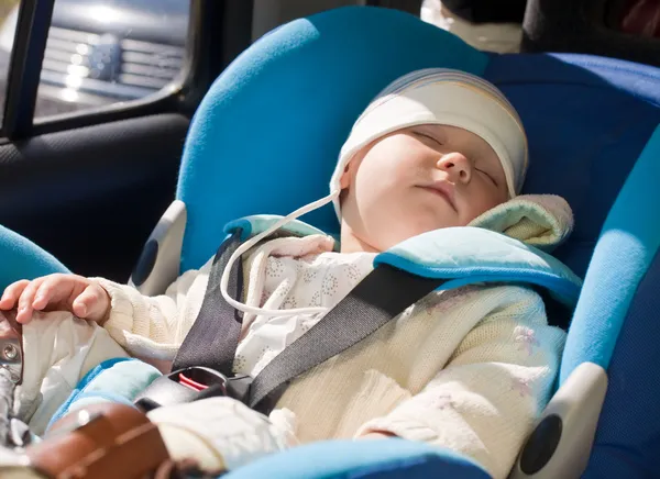 Toddler in a car seat — Stock Photo, Image