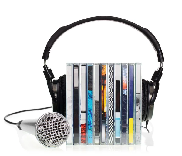 Headphones on stack of CDs — Stock Photo, Image