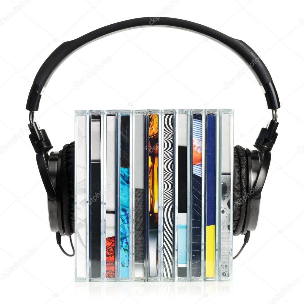 Headphones on stack of CDs