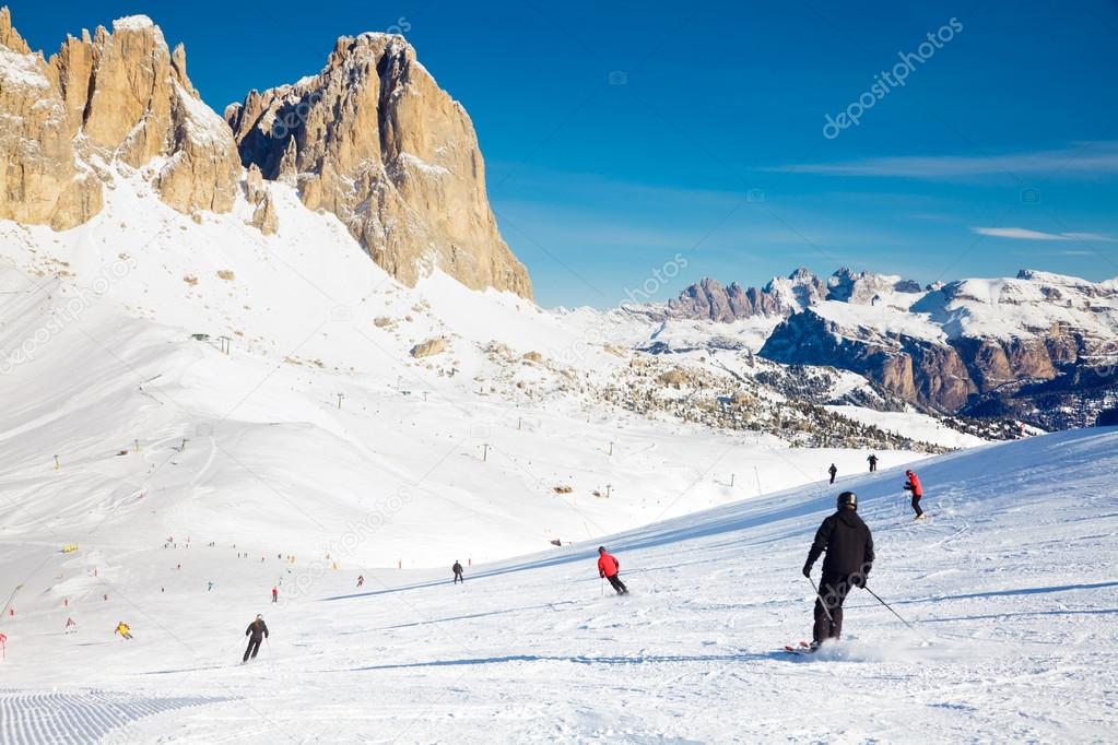 Skiers on a Piste