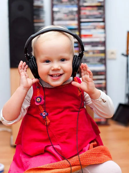 Toddler with headphones — Stock Photo, Image