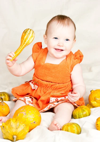 Infant with pumpkin — Stock Photo, Image