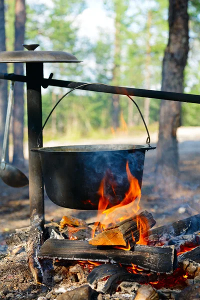 Cauldron over campfire — Stock Photo, Image