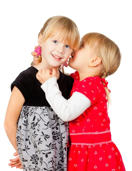 Little girls sharing a secret Stock Photo