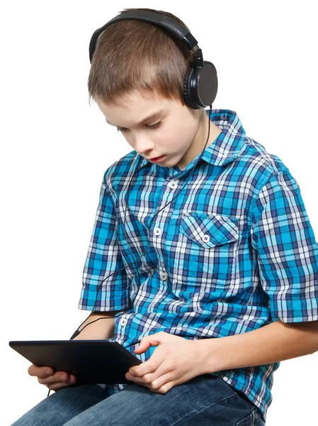 Kid playing with a tablet computer — Stock Photo, Image