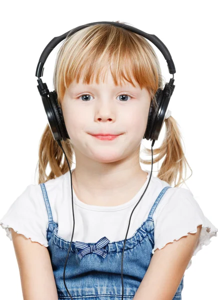 Little girl wearing headphones — Stock Photo, Image