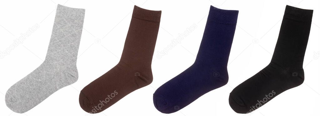Four cotton socks of various colors isolated on a white background