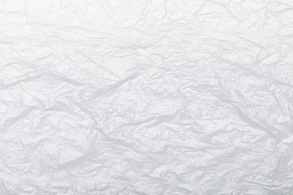 白い背景にしわポリエチレンプラスチック製のラップ — ストック写真