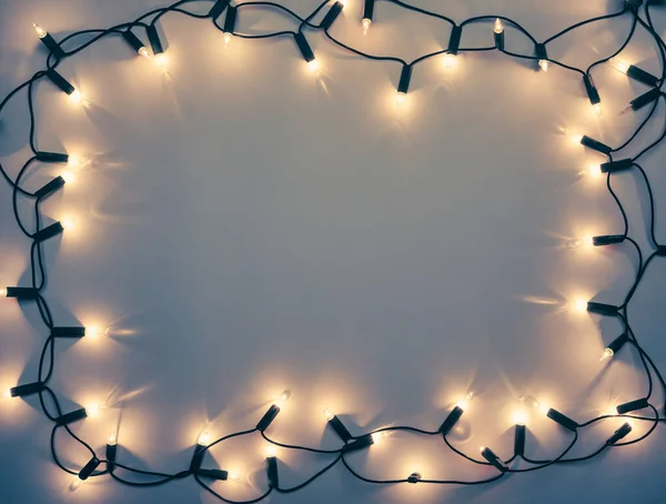 Vintage Weihnachtsbeleuchtung Umrahmt Getönten Hintergrund — Stockfoto