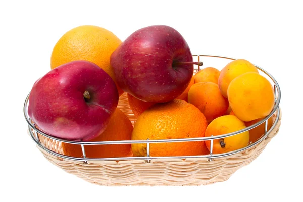 Apple, orange, apricot on bowl isolated on white background — Stock Photo, Image