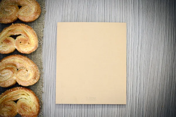 Fresh Tasty Pretzel on Woody Background — Stock Photo, Image