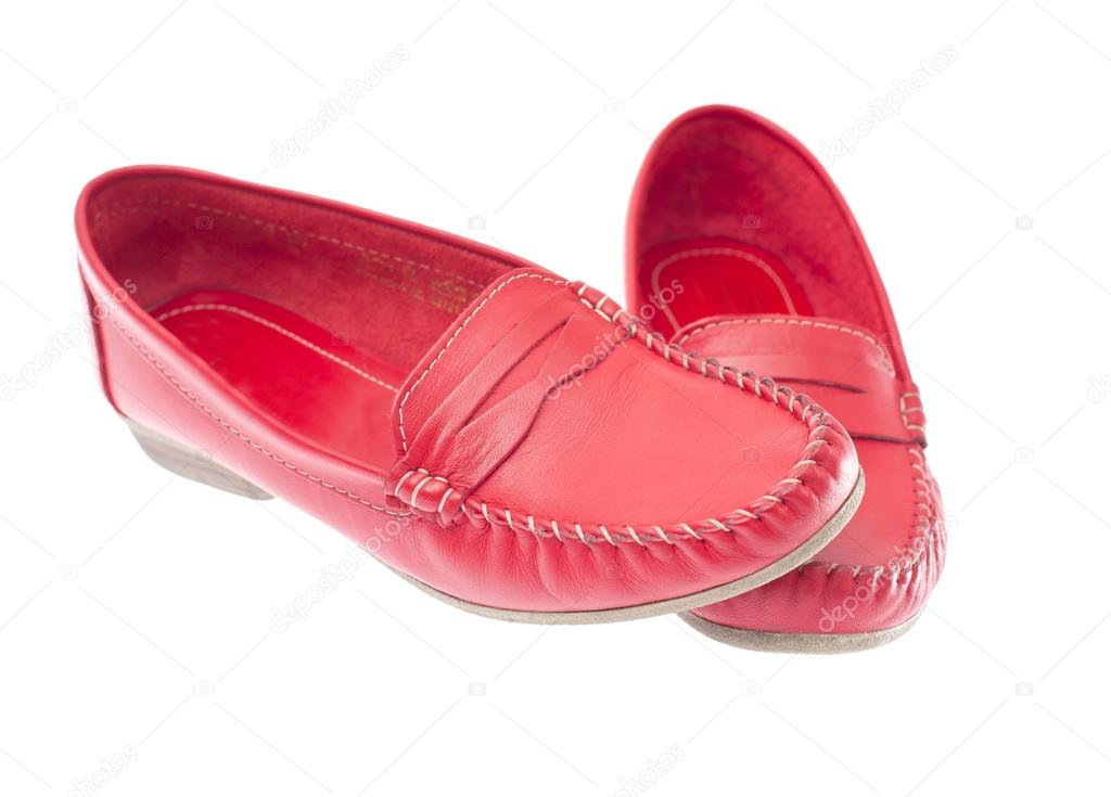 Red moccasins isolated on white background