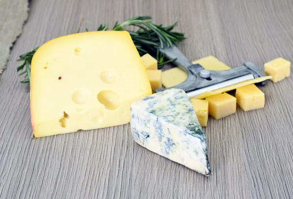 Cheese on Wooden Background — Stock Photo, Image