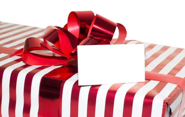 Christmas Present with Ribbon and tag. Isolated on white backgro — Stock Photo, Image
