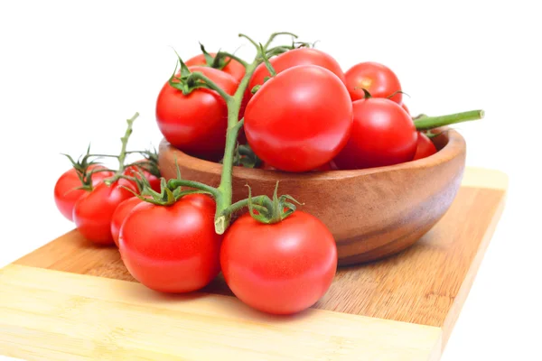 Branch of tomatoes isolated on white background — Stock Photo, Image