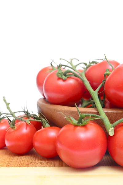 Branch of tomatoes isolated on white background — Stock Photo, Image