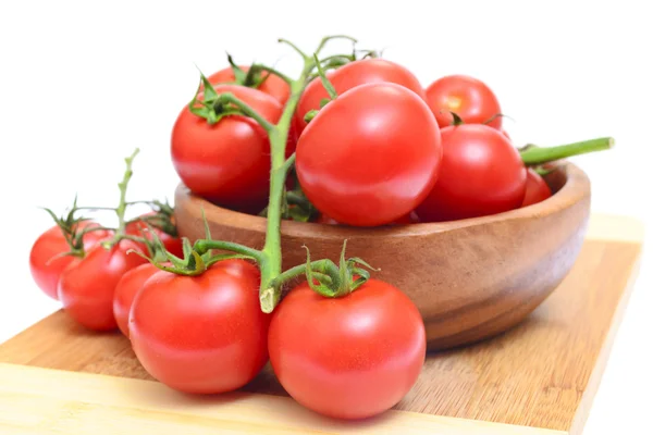 Branch of tomatoes isolated on white background — Stock Photo, Image