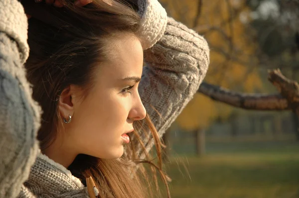 Young woman holding her hair — Stock Photo, Image