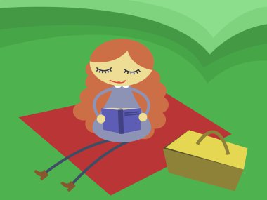 Kız okuma kitabı çayırda